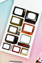 Load image into Gallery viewer, Sheet of retro television-shaped stickers on a colorful background