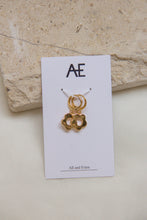 Load image into Gallery viewer, Gold hoop earrings with flower charms
